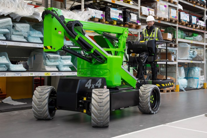 HR12 4x4 turning inside a factory, showing non-marking tyres on light coloured flooring